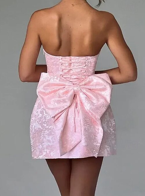 mini women's light pink strapless dress for a birthday party Sparkly  Twist Cutout, Size M Team it with blush heels and a chic updo for a dreamy look Mini Dress Baby Pink Skye