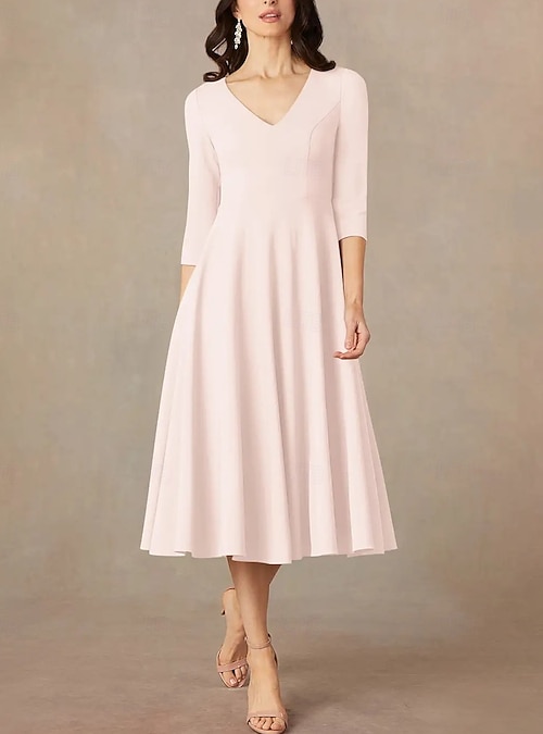 minimalist wedding guest dress 12 Minimalist-Inspired Wedding Guest Styles That Are Luxe AF