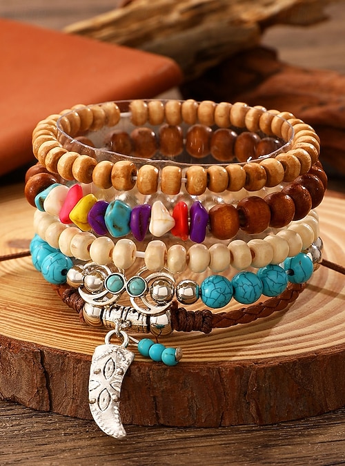 Bracciale con perline miyuki colorate, nodo centrale simbolico, regola