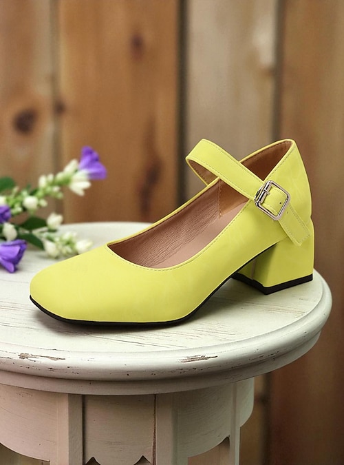 yellow dress and purple shoes Carrie Bradshaw Best Shoes: From Jimmy Choo to Ren Caovilla [PHOTOS]