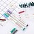 billige Skriveværktøjer-Pastels Pen Permanente markører Pen Rød / Sort / Blå Blæk Farver Til Skoleartikler Kontorartikler Pakke med 10 pcs