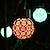 economico Illuminazione vialetto-lanterna a sospensione a led solare esterna ip65 impermeabile lampada a sfera scavata per esterno giardino cortile decorazione del patio luce solare colorata 1x 2x