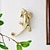 olcso fali szobrok-európai stílusú gyík fali dekoráció arany retro fali dekoráció fa gyanta anyag kézzel készített kézműves dekoratív díszek otthoni faldekorációhoz