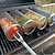 halpa grillit ja ulkona ruoanlaitto-pyörivä grillikori - sus304 ruostumattomasta teräksestä valmistettu grilli keittogrilli - ulkona pyöreä bbq nuotiokrilli - retkeilypiknik-astiat