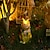baratos Escultura e luzes de paisagem-Luzes solares coelho estátuas e estatuetas de jardim coelho ao ar livre segurando uma borboleta luz solar para decoração de jardim fora estátuas e esculturas ao ar livre para jardim coelhinho da