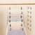 voordelige Haken &amp; bevestiging-ruimtebesparende metalen meerlaagse broek broek rok hanger opvouwbare kast hanger met anti-slip clips