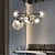 preiswerte Globus-Design-LED-Kronleuchter, Design-Klassiker, Platte, schwarz, 78 cm, kreisförmiges Licht mit warmweißen Rauchglasschirmen