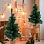 economico Figure da collezione-Mini albero di Natale artificiale, pino artificiale di Natale in miniatura per le vacanze con base in borsa di stoffa per la decorazione di ornamenti da tavolo per desktop di feste di Natale di home