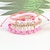 economico Accessori indossabili-Set casuale di 5 braccialetti popolari in ceramica morbida, bracciale con perline con lettera e volto sorridente in ceramica morbida rosa