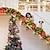 billige LED-stringlys-1 stk, kunstig julekrans, 20leds grønn rotting med røde blomsterdekorasjoner til hjemmetrapper peis verandadørsdisplay innendørs utendørs juledekor