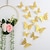 abordables Autocollants muraux-12 pièces décorations papillon dorées - art mural 3D pour les fêtes, l&#039;artisanat et les baby showers - autocollants faciles à appliquer pour une décoration belle et élégante