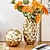 billige Skulpturer-vase med geometrisk diamantmønster med gull- og sølvfolie, harpiksmateriale med origami-tekstur, ideell for hjemmeinnredning, utstillingsvisning, myke møbler i modellrom og blomsteroppsatser