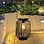 tanie Światła ścieżki i latarnie-Żelazna latarnia słoneczna na dziedzińcu zewnętrznym ogród latarnia krajobrazowa lampa dekoracyjna wodoodporna ręczna lampa z wydrążonym drutem wolframowym 1 szt