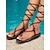 billige Ferietøfler-svarte gladiator-sandaler med snøring for kvinner - flatt design med stropper for sommerstrand og fritidsklær