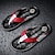 billige Ferieresorter-højtydende flip-flops i imiteret læder til mænd - sort og rød med racer-inspireret tekstureret rem til udendørs eventyr