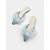 abordables Sandalias planas de mujer-Mules blancos planos con punta esponjosa: cómodos zapatos sin cordones de piel sintética para looks casuales y elegantes.