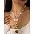 abordables Accessoires de vacances-Ensemble de colliers bohèmes superposés en coquillages et perles pour femmes – pendentif turquoise de style plage et breloques dorées pour les vacances d'été et les festivals