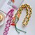 abordables Correas para el teléfono y muñequeras-Correa trenzada multicolor para teléfono con clip desmontable para funda de teléfono: cordón ajustable para el cuello para mujeres y hombres.