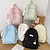 cheap College Backpacks-Women's Light Green Textured School Backpack with Cute Teddy Bear Keychain, Large Capacity Lightweight Bookbag for Teen Girls, College, and Casual Daily Use
