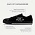 billiga Herrsneakers-Svarta herrsneakers i canvas med trycket &quot;don&#039;t grow up&quot; – bekväma, avslappnade snörskor för vardagsbruk, streetstyle och utomhusaktiviteter