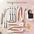 cheap Kitchen Set-A 19-piece kitchen cookware and knife set with building blocks, including an 11-piece silicone cookware set, 5 sharp stainless steel chef's knives, mixing tongs, and a cutting board
