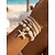 preiswerte Urlaubszubehör-Set mehrlagiger Armbänder im Boho-Stil für Damen, aus Legierung und Harz, mit Seestern- und Muschelanhängern, perfekt für Strandurlaub und lässigen Alltag.