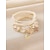 preiswerte Urlaubszubehör-Set mehrlagiger Armbänder im Boho-Stil für Damen, aus Legierung und Harz, mit Seestern- und Muschelanhängern, perfekt für Strandurlaub und lässigen Alltag.