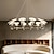 voordelige Spoetnik-ontwerp-Moderne zwarte LED-kroonluchter met witte bloembladkappen, 1/6/9/12-kops Sputnik-design, eigentijdse ringvormige hanglamp voor de eetkamer, woonkamer, keukeneiland en slaapkamer.