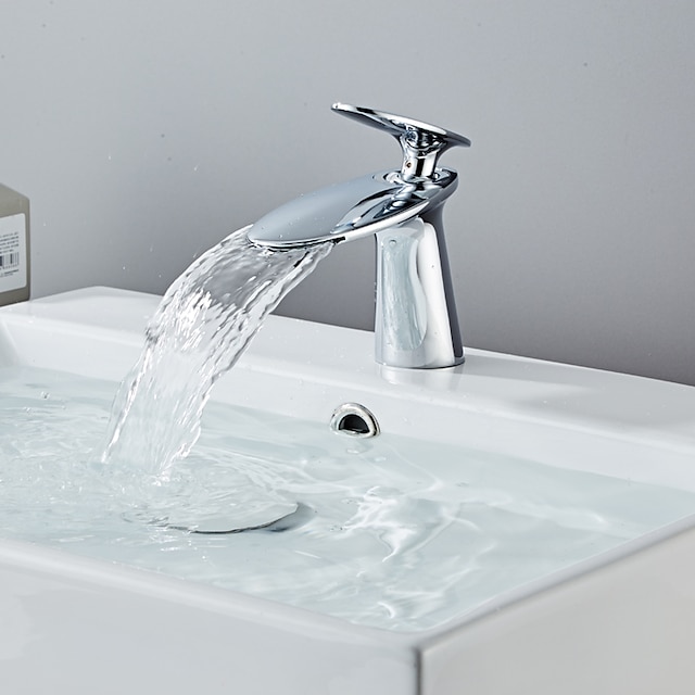  handfat kran, vattenfall i mässing med ett handtag i ett hål i modern stil med varmt och kallt vatten