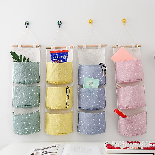  self-produced and self-sold creative cotton and linen storage hanging bag 3 layer hanging pocket small and fresh little storage bag