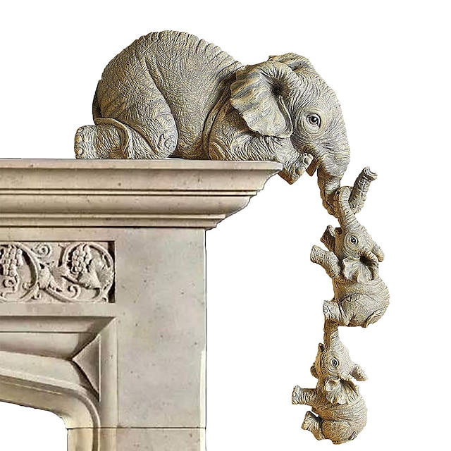  elefántgyanta díszek három részes díszek 3 elefántmama és két baba lóg a kézműves szobrok szélén