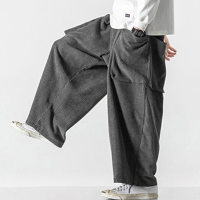  Męskie Spodnie dresowe Spodnie dresowe z szerokimi nogawkami Spodnie sztruksowe Kieszeń Ściągana na sznurek Elastyczny pas Równina Komfort Oddychający Na zewnątrz Codzienny Wyjściowe Moda Codzienny