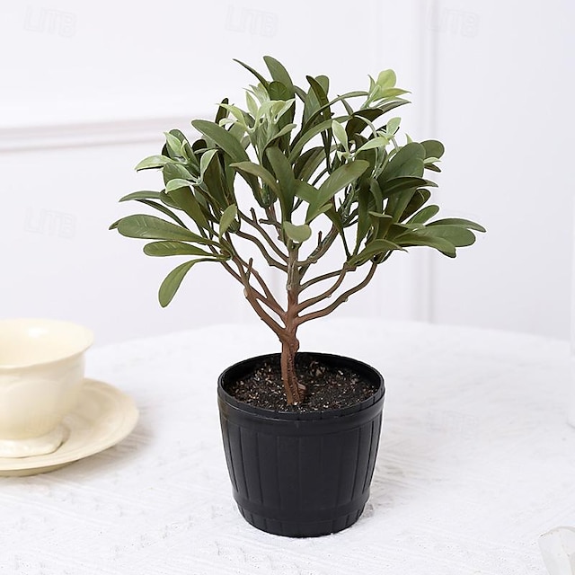  Bring Timeless Elegance into Your Home with Realistic Magnolia Leaf Potted Plants, Perfect for Enhancing Your Interior Decor with a Touch of Natural Beauty