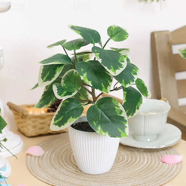  Mejore la decoración de su hogar con plantas realistas de eucalipto en macetas, agregando un refrescante toque verde a su espacio vital.
