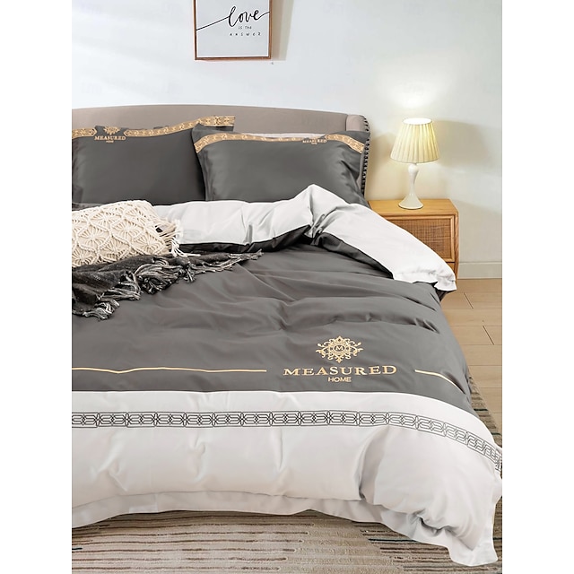  Set copripiumino da 4 pezzi, 100% cotone biologico, tessuto morbido e traspirante, include copripiumino e federe per un sonno confortevole.
