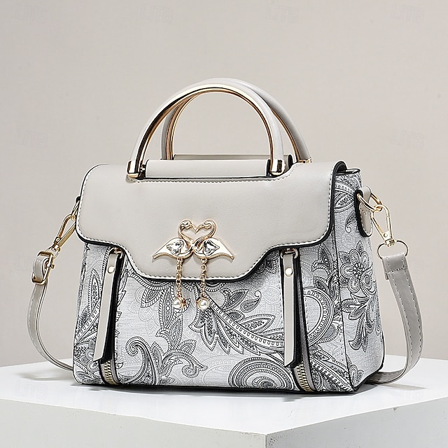  Elegante bolso de mano con colgante de cisne para mujer: diseño paisley en blanco y negro con detalles dorados y correa ajustable