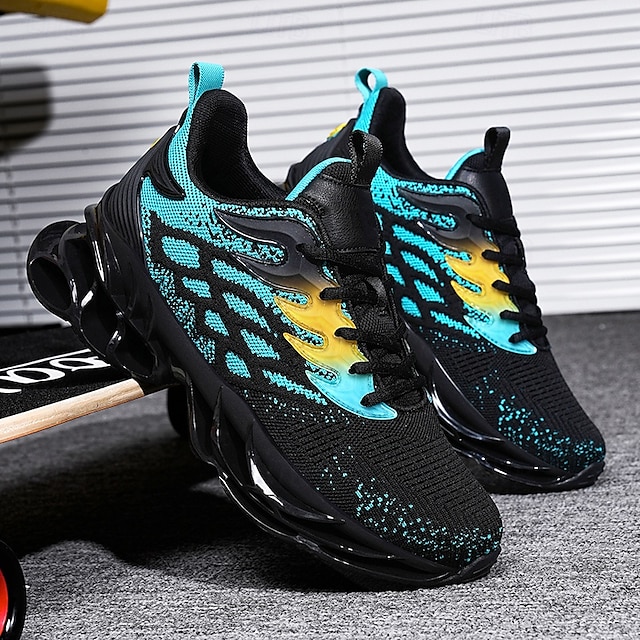  blå atletiske sneakers til mænd med unikt hulsåldesign, åndbar strikoverdel og flammedetaljer – lette løbesko med orange accenter