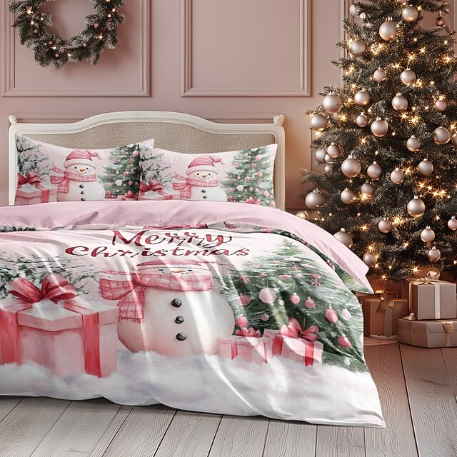  クリスマス用掛け布団カバーセット。雪だるまデザインのピンク。クリスマスのお祝いのホリデー寝具には、掛け布団カバーと枕カバーが含まれており、寝室に気まぐれな季節感を加えるのに最適です。