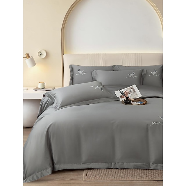  Set copripiumino da 4 pezzi, 100% cotone biologico, tessuto morbido e traspirante, include copripiumino e federe per un sonno confortevole.