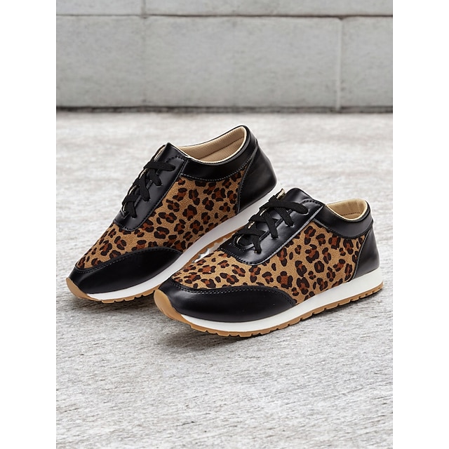  trendiga leopardmönstrade sneakers för kvinnor med svarta detaljer | perfekt för vardagskläder