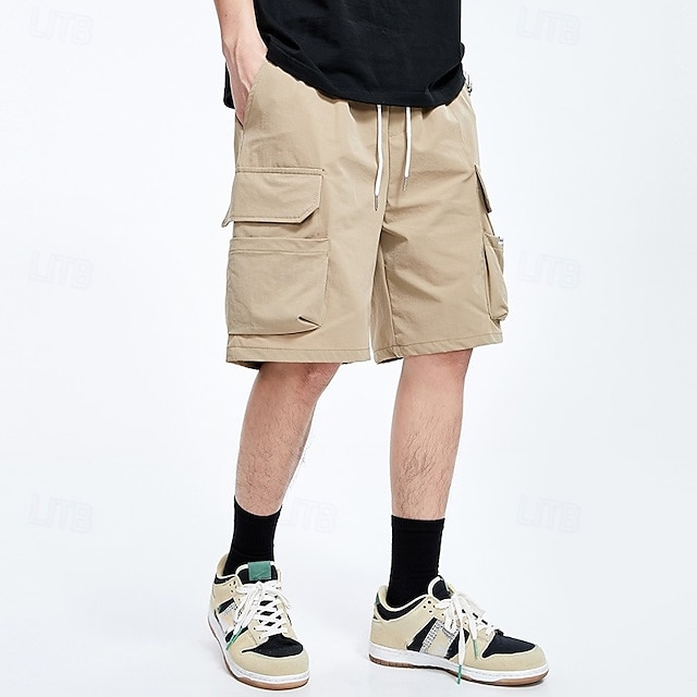  Per uomo Pantaloncini modello cargo Pantaloncini A cordoncino Vita elastica Multi tasca Liscio Indossabile Breve Esterno Giornaliero Campeggio e hiking Di tendenza Classico Nero Cachi