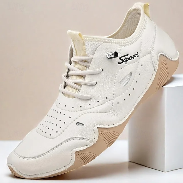  tênis esportivo masculino branco de couro sintético com design perfurado, leve e confortável, ideal para atividades casuais e ao ar livre