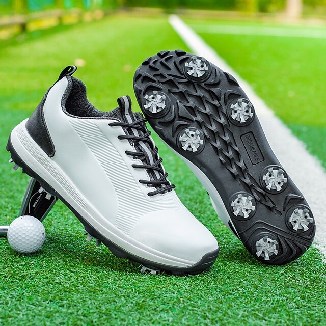  svarta och vita golfskor för män med spetsad sula, ventilerande ovandel och lätt design för komfort och stöd på golfbanan
