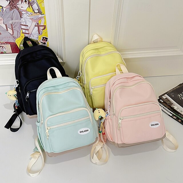  Sac à dos rose pour fille, idéal pour l'école et le quotidien – cartable léger avec poche zippée sur le devant, idéal pour les adolescentes et les étudiants.