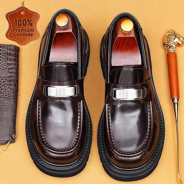  Мужские коричневые кожаные пенни-лоферы с металлической пряжкой – классические туфли для деловых встреч, официальных мероприятий и офиса.