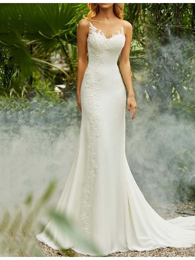 spaghetti strap trumpet wedding dress