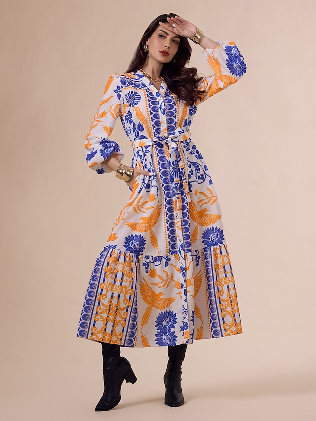 Vestido largo bohemio con escote en V, mangas farol y cinturón botánico