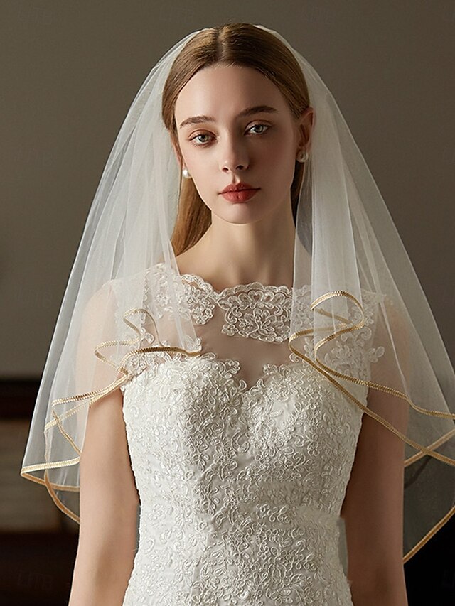  Twee-laags Contemporary  Stijlvolle Bruidsluier Elleboogluiken met Fringe Tulle