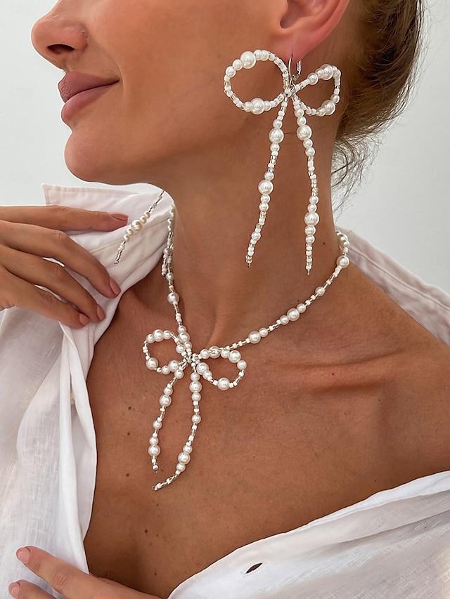  Set di collana con fiocco di perle e orecchini pendenti da donna: eleganti gioielli di tendenza per feste di moda e cocktail party