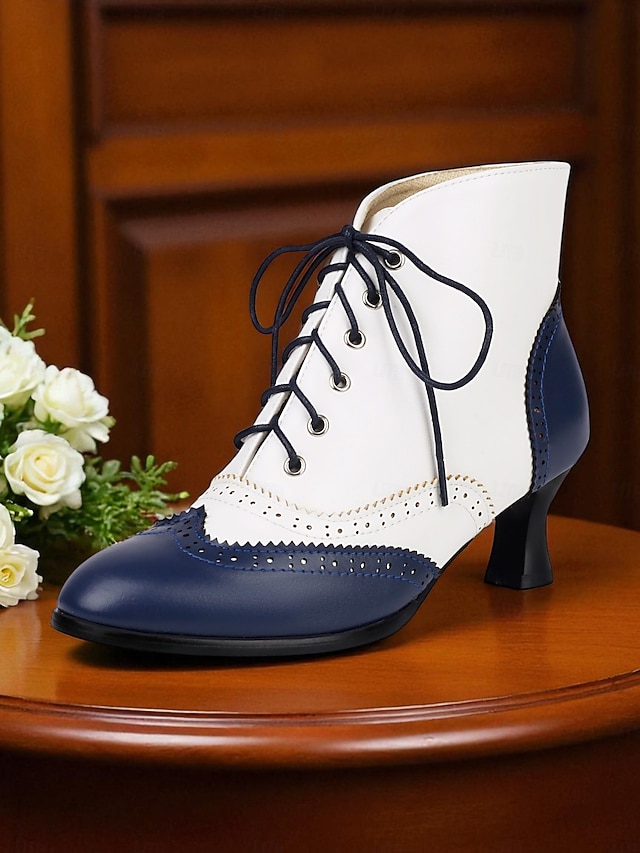 női 1950-es évekbeli vintage oxford bokacsizma – kétszínű, fűzős, brogue sarkú, szárnyas hegyű kialakítású, edward stílusban, retró öltözékekhez, cosplayhez, teadélutánokhoz és mindennapi viselethez.